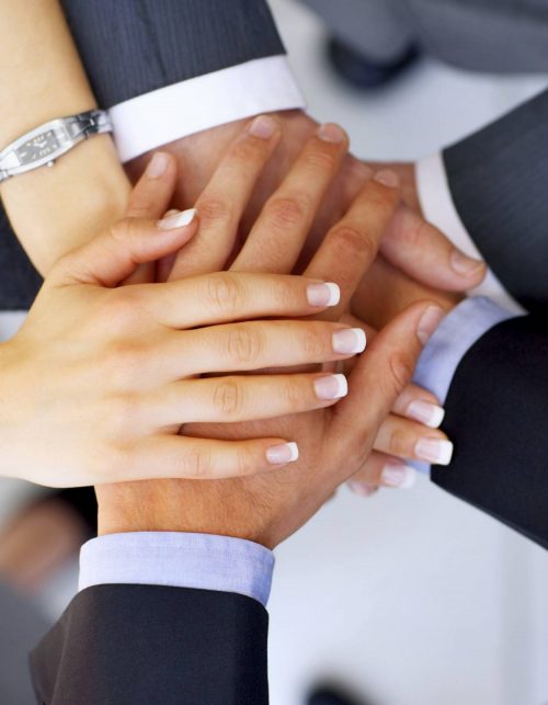 Hands on top of each other. Symbolic picture.